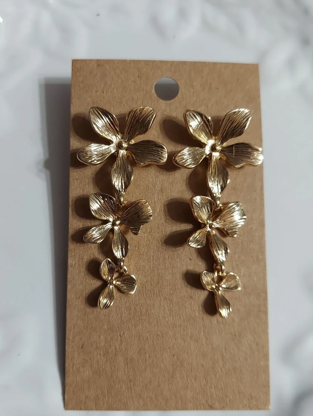 Textured Gold Tone/Dogwood Flower Trio Drop Earrings